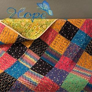 Homemade quilt 59 x 41, folk art multicolor patterned